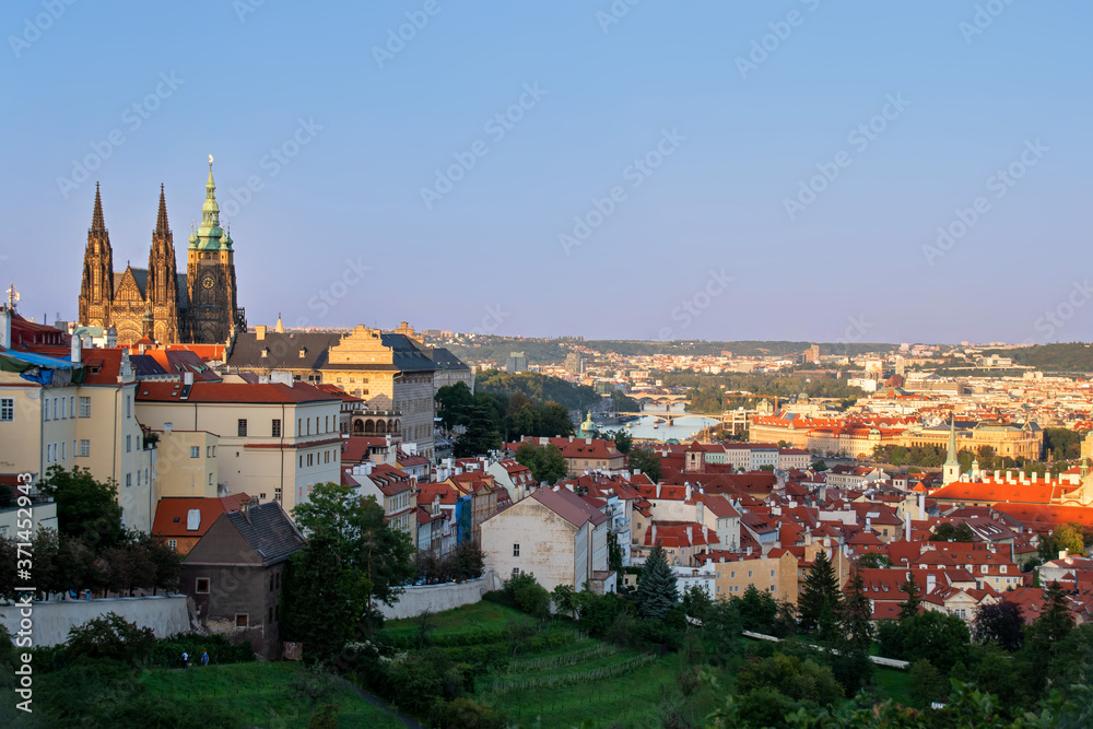 Prague at sunset. View from Petrin Hill. Visible Prague Castle and the Vltava River