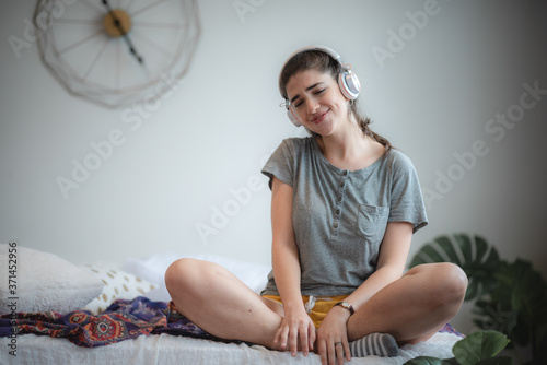 smiling young women stay at...
