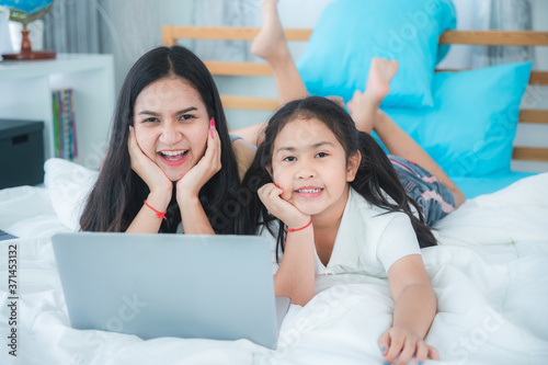 young women and girl using ...