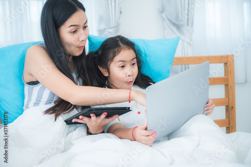 young women and girl using ...