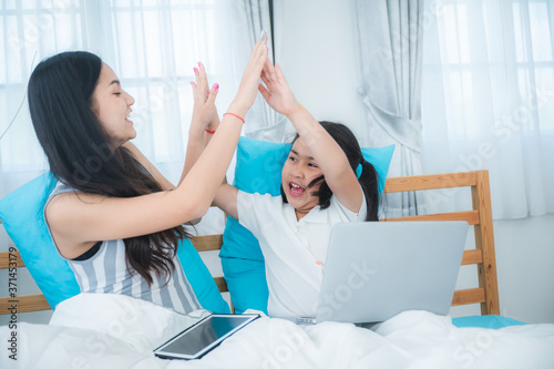 young women and girl using ...