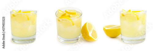 Glass with lemon lemonade and ice on a white background. . High quality photo