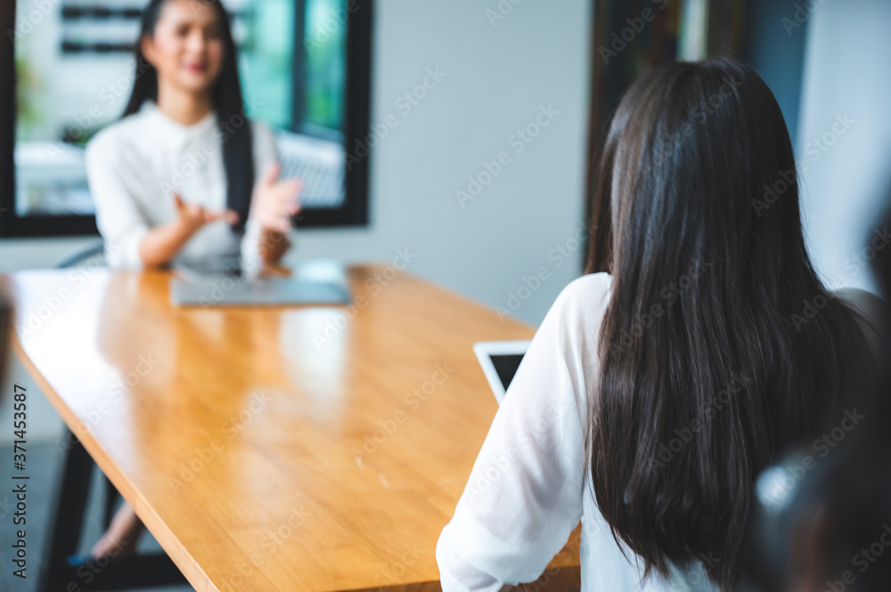 two people talking on table and keep distance, social distancing concept two people talking on table and keep distance, social distancing concept