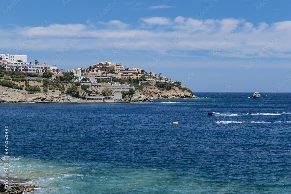 A beautiful view of the coast and Gulf of Mononaftis, near the popular village of Agia Pelagia in Crete, Greece. A beautiful view of the coast and Gulf of Mononaftis, near the popular village of Agia Pelagia in Crete, Greece.