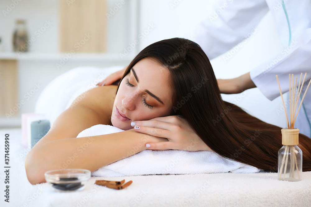 massage therapy. enjoying a massage in the spa massage therapy. enjoying a massage in the spa