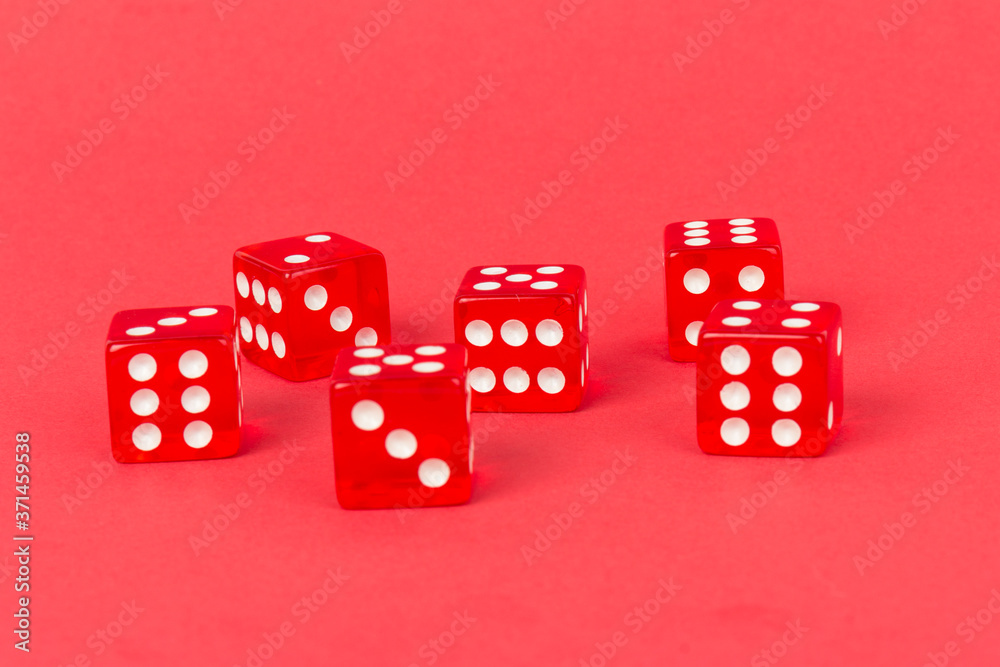 Transparent and red glass dices isolated on red background. Transparent and red glass dices isolated on red background.