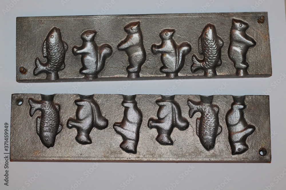 custom made wallpaper toronto digitalVintage cast iron lollipop molds.