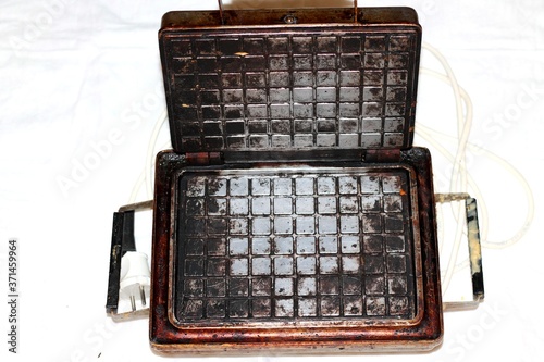 Wallpaper Mural 
Vintage cast iron waffle iron. Torontodigital.ca