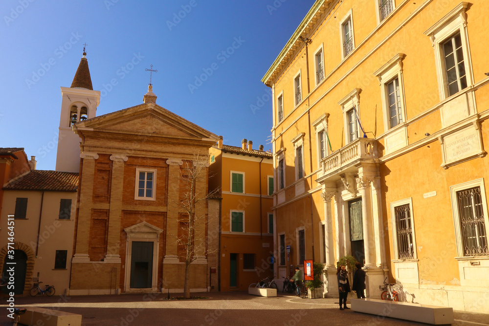 Pesaro, little square with church and coloured houses