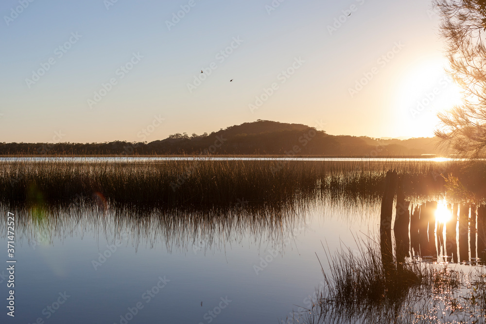 Sunrise over the calm lake
