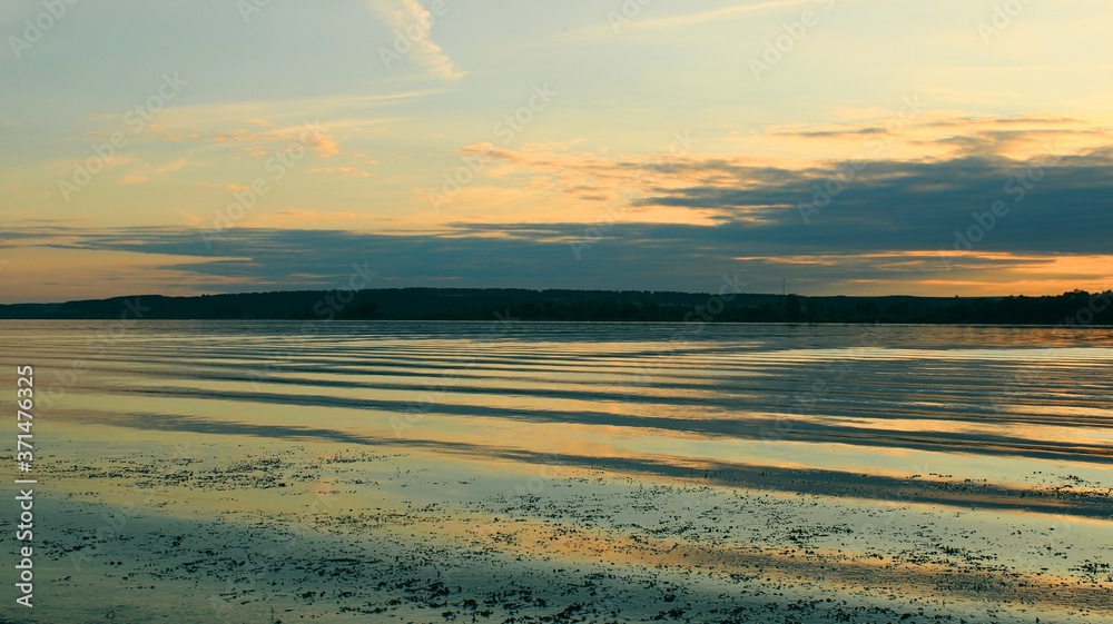Obraz premium sunset over the river