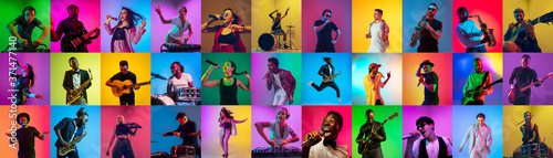 Collage of portraits of 21 young emotional talented musicians on multicolored background in neon light. Concept of human emotions, facial expression, sales. Playing guitar, singing, dancing, jumping. photo
