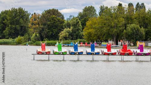 Colorful pedal boats on a pier in Lake Balaton