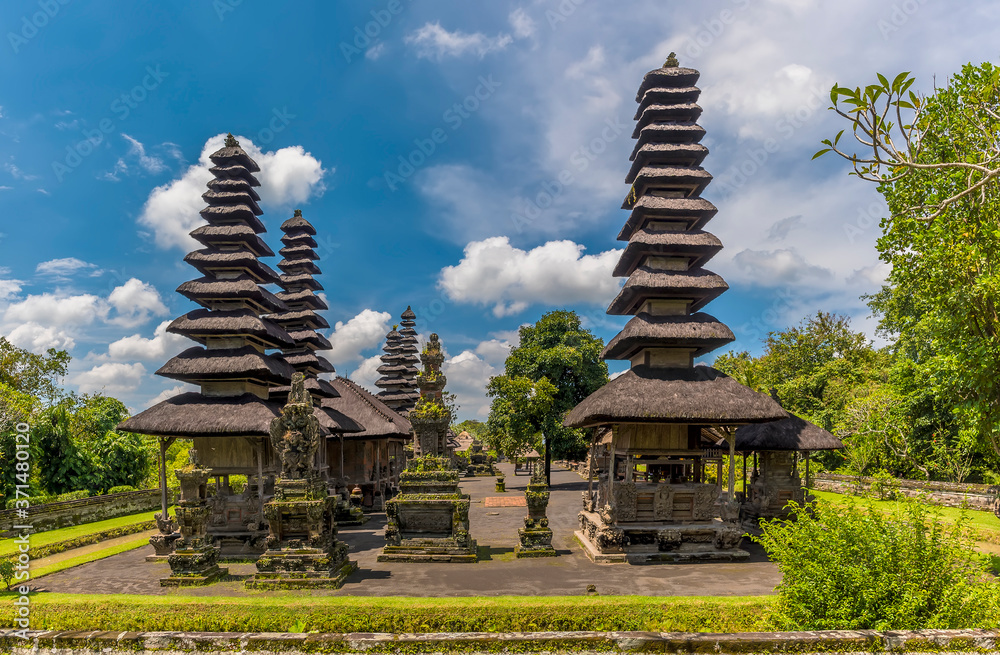 A view from the end of the main sanctum of Meru towers and pavilions in the temple of Pura Taman Ayun in the Mengwi district, Bali, Asia