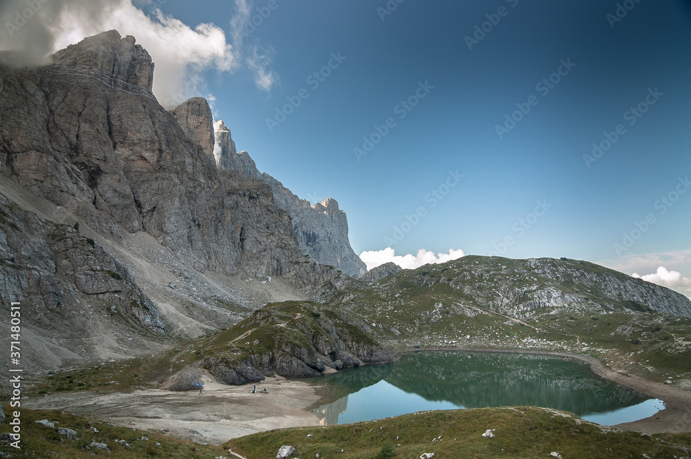 Coldai lake as seen from the trail descending from Coldai refuge on Alt Via 1 trek to Vazzoler refuge, Civetta mountain group, Dolomites, Italy.