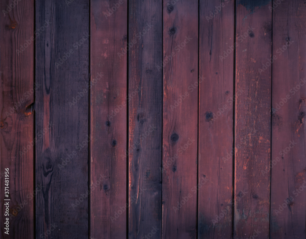 Naklejka premium Red background made of wood