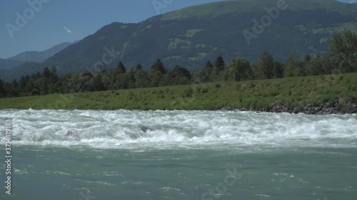 Cascades of the young Alpine Rhine river in the Principality of Liechtenstein in the European Alps