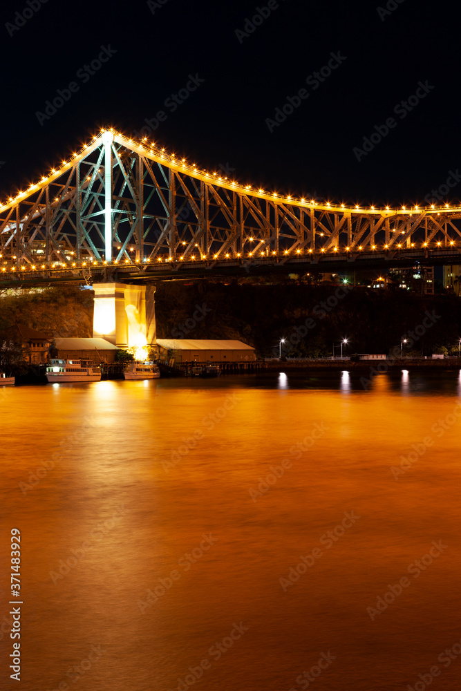 Illuminated Brisbane bridge at night
