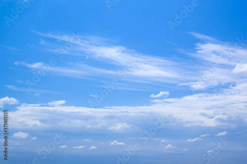 White clouds and blue sky. Blurred clouds background.