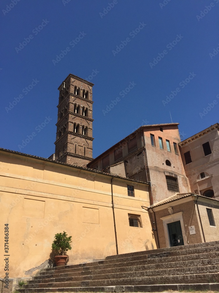 Italian yellow houses and a bell tower in Rome Italian yellow houses and a bell tower in Rome