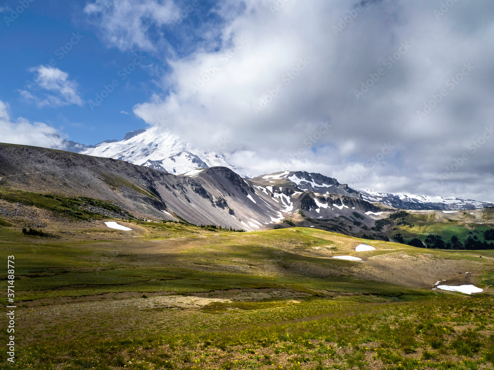 Volcano Mountain Landscape with Wildflowers and Blue Sky