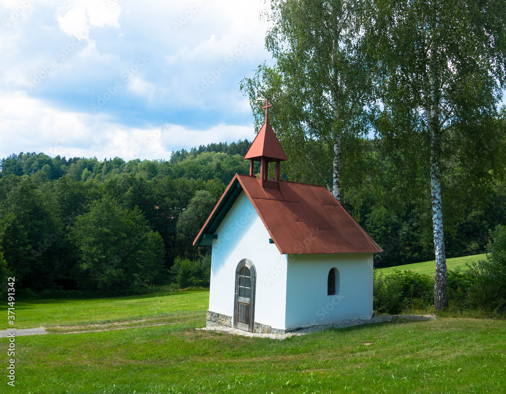 View from wine hiking trail to a small chapel, bavarian forest, Germany