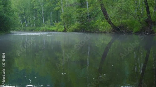 Taiga river covered with fog. 4K