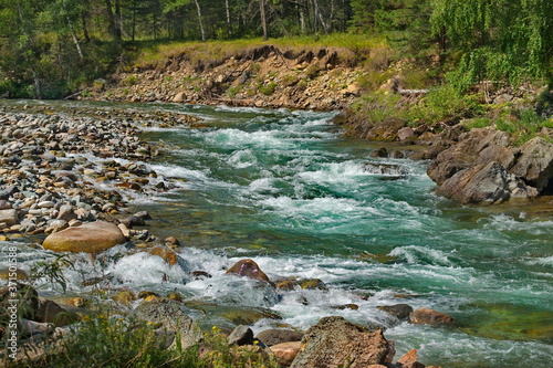 Russia. South Of Western Siberia. mountain Altai. Rocky rapids on the river Kumir near the village of Ust-Kan. photo