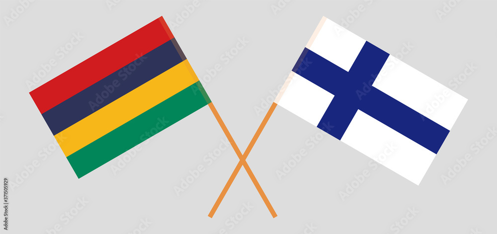 Crossed and waving flags of Mauritius and Finland