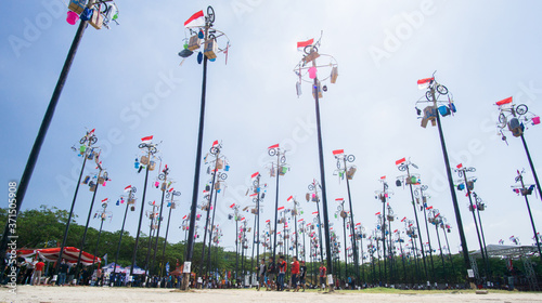 17 August 2009, Jakarta, Indonesia: Panjat Pinang or Greasy Pole Climbing, An Independence Day Celebration at Ancol, Jakarta, Indonesia. photo