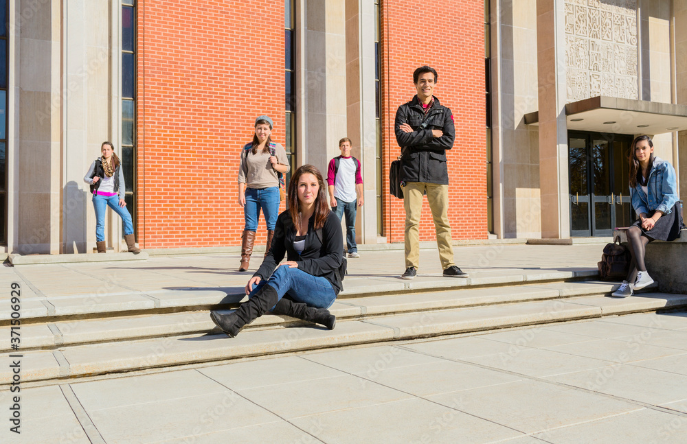 Students on campus steps Students on campus steps