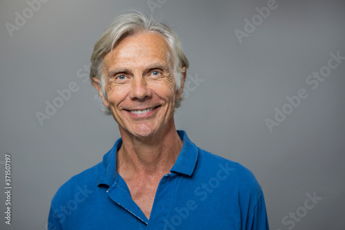 Close up of smiling older Caucasian man photo