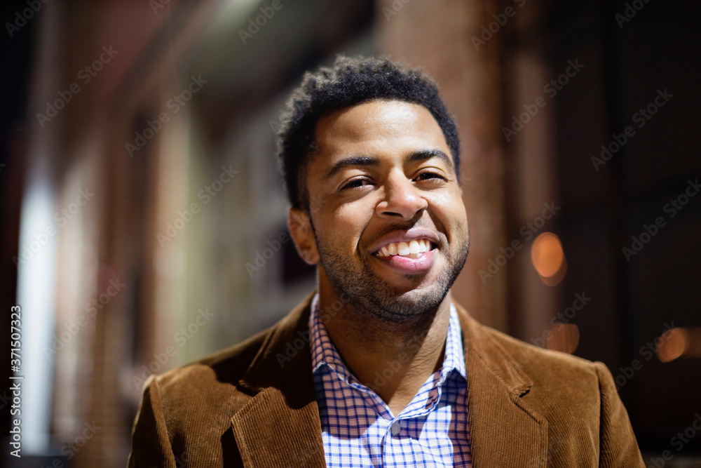 African American businessman smiling outdoors African American businessman smiling outdoors
