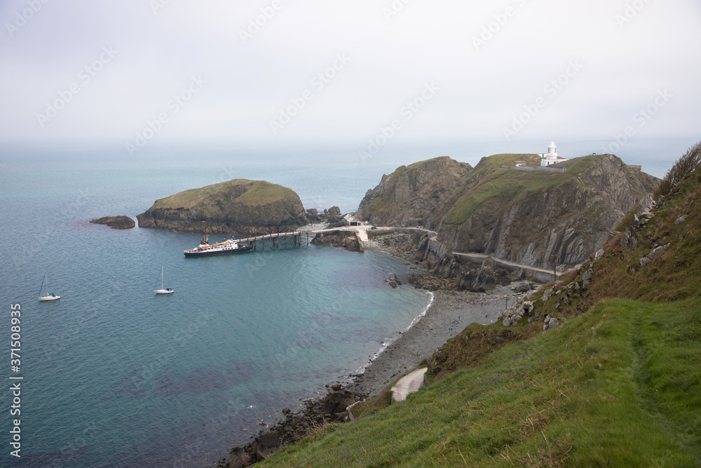 Views of the southern end of Lundy Island with a misty sky, The Bristol Channel, Devon, UK