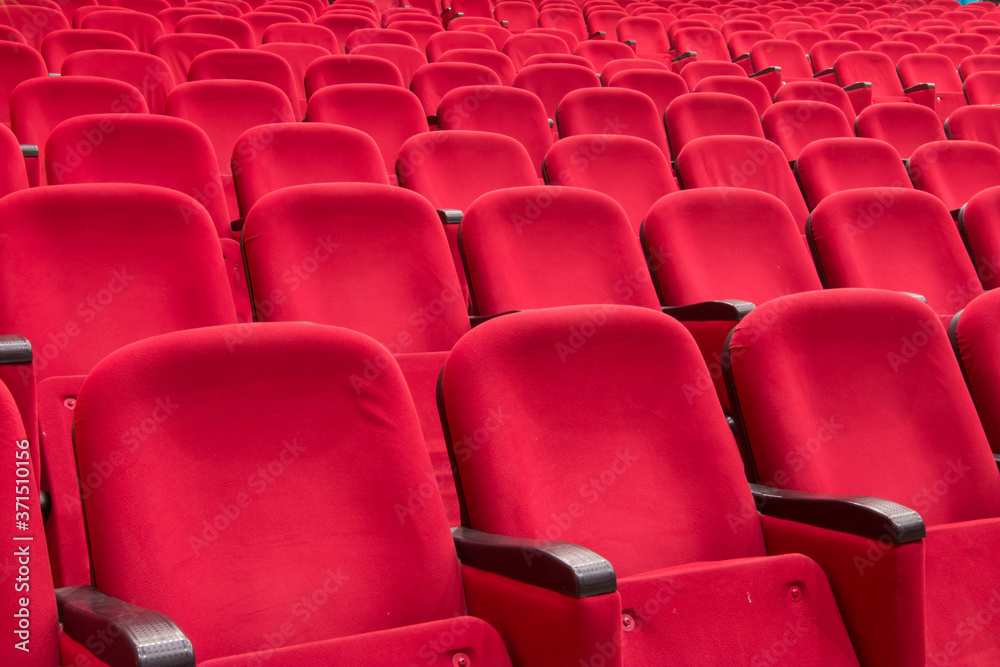 empty red cinema or theater seats empty red cinema or theater seats