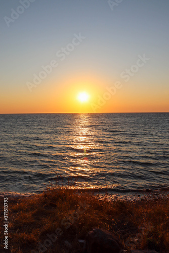 sunset over the sea © yagizkengil