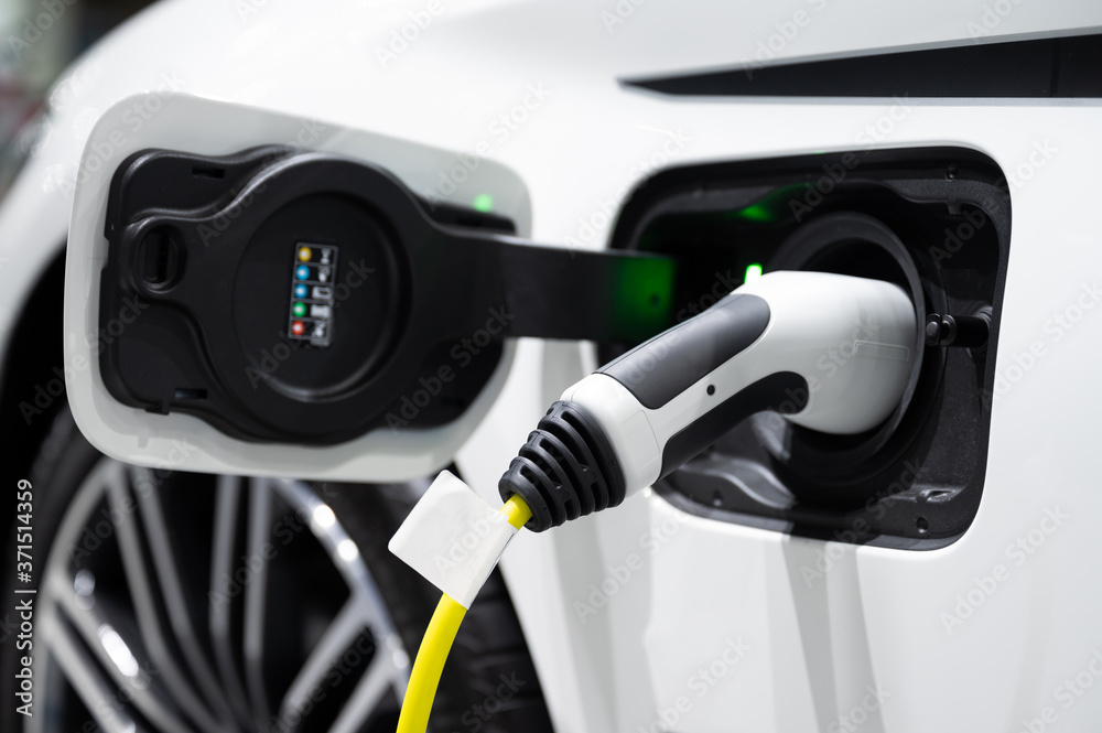 Modern electric vehicle charging in station Modern electric vehicle charging in station