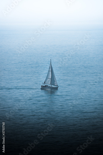 sailboat in the sea © JGeab