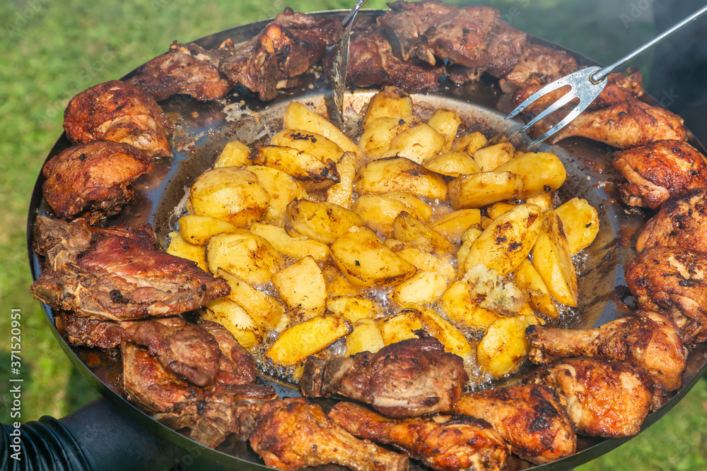 Kotlovina dish, combines various kinds of meat with potatoes Kotlovina dish, combines various kinds of meat with potatoes