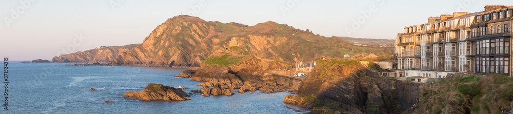 Panoramic view from the Capstone Hill towards Beacon Point at sunset, Ilfracombe, Devon, UK