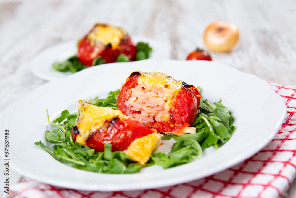 Stuffed tomatoes. Tomatoes baked with cheese and meat Stuffed tomatoes. Tomatoes baked with cheese and meat