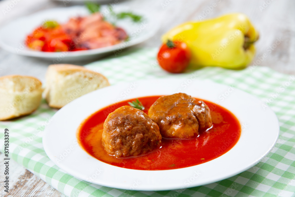 Meatballs with tomato sauce in a plate Meatballs with tomato sauce in a plate