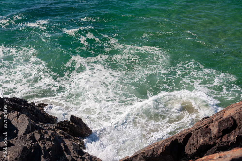 Rocky shore of Australian coastline with crystal clear waters