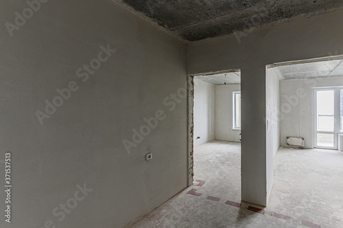 Russia, Moscow- February 10, 2020: interior room apartment rough repair for self-finishing. interior decoration, bare walls of the premises, stage of construction