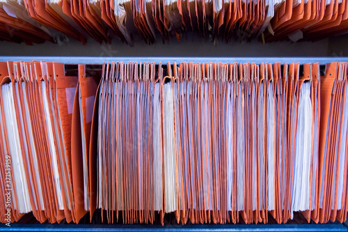 good old days of piles of files and bureaucracy, a pile of files in times of digital files, modernization of administration and home office
