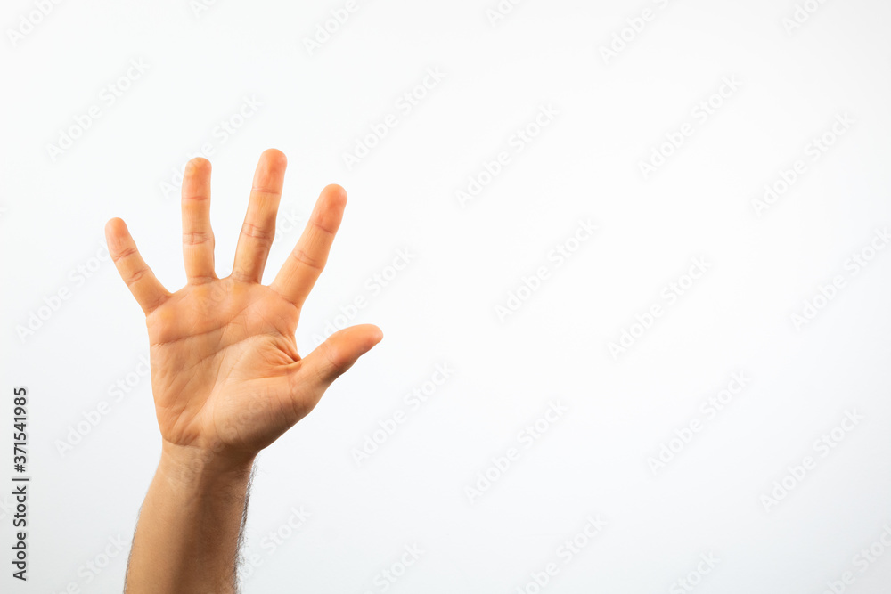 hand waving on a white background with high key effect hand waving on a white background with high key effect
