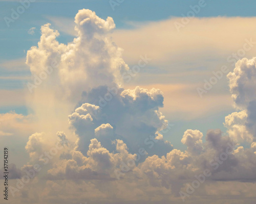 Canvas Print Fluffy clouds in the blue sky
