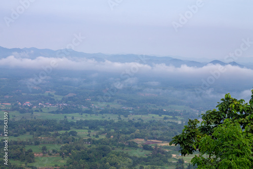 Landscape lot of fog.Fog cover the mountain forest. © pichai