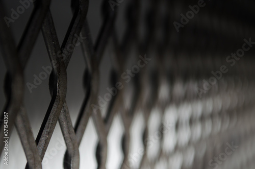 Selective focus of expanded metal mesh.