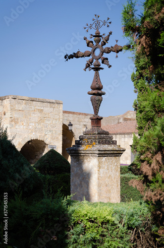 Cross in the gardens of the Plaza de Amayuelas at the back of the Cathedral of Ciudad Rodrigo, Salamanca, Spain photo